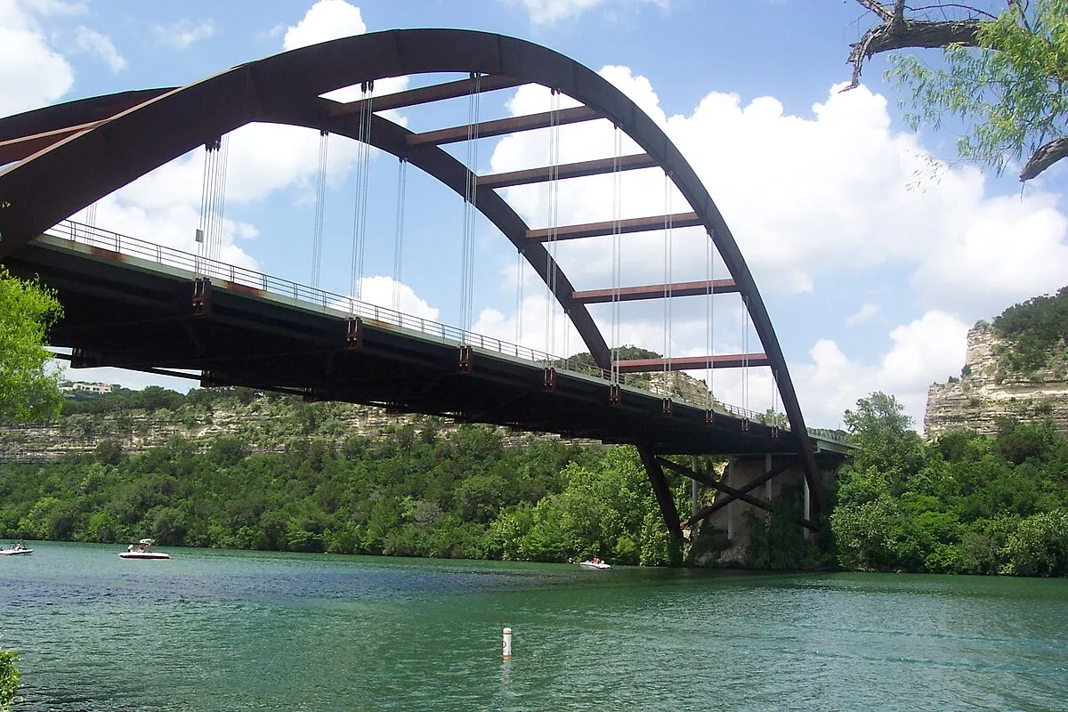 Pontoon boat near Pennybacker Bridge on Lake Austin
